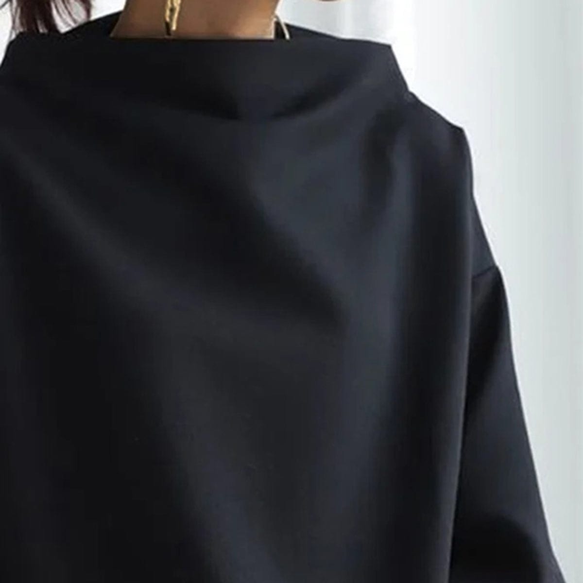 Ligne™ | Pull chic à col montant