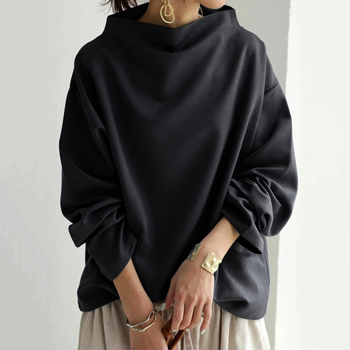 Ligne™ | Pull chic à col montant